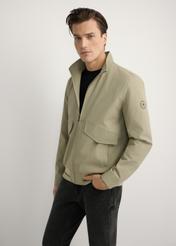 Men's khaki transitional jacket KURMT-0418-1B(W26), front product view on model. Half silhouette visible.