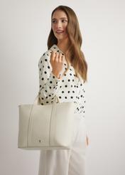 Cream leather shopper bag TORES-1272-0B(W26) - view of the bag held in the model's hand, against a light background.