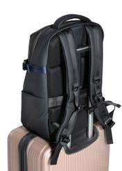 Black men's travel backpack TORMN-0392-9J(W26), product view on suitcase on white background.
