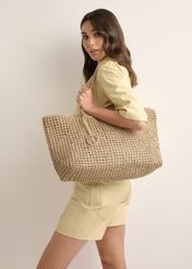 Beige leather woven handbag TORES-1300-0C(W26), product view on model's shoulder. Half of silhouette visible.