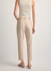 Beige women's pleated trousers SPODT-0090-1B(W26), back view of the product on the model. Half of the silhouette visible.