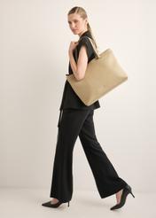 Beige leather women's shoulder bag TORES-1357-1B(Z26), product view on model's shoulder. Full body visible.