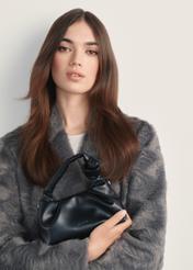 Small women's handbag with chain TOREC-1095-99(Z25) - front view of the product on a model against a white background. Half of the silhouette visible.