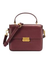 Burgundy women's trunk handbag TOREC-1080-49(Z25) - front view of the product on a white background.