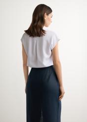 Women's white shirt KOSDT-0189-0A(W26), back view of the product on the model. Half of the silhouette visible.