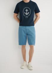 Men's blue shorts SZOMT-0029-7B(W26), front view of the product on the model. Half of the silhouette visible.