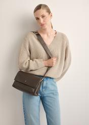 Dark brown leather women's shoulder bag TORES-1347-1I(Z26), product view on model's shoulder. Half of silhouette visible.