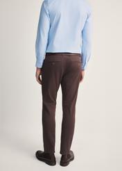 Chocolate men's trousers SPOMT-0103 A-90(Z 25), product visible from the back on the model, half of the silhouette visible.