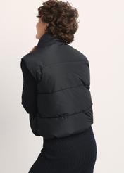 Black women's vest KAMDT-0033-99(Z25), product view from the back on the model. Half of the silhouette visible.