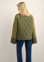 Women's khaki jacket KURDT-0665-8B(Z26), back view of the product on the model. Half of the silhouette visible.