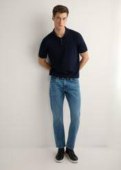 Men's dark blue jeans JEAMT-0021-7H(W26), front view of the product on the model. Full body visible.