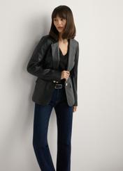 Women's black leather jacket KURDS-0445-99(W26), front view of the product on the model. Half of the silhouette visible.