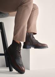 Brown men's leather ankle boots BUTYM-0518-09(Z25), product view on model's feet against a light background.