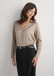 Women's cool beige shirt KOSDT-0155-1K(W26), front view of the product on the model. Half of the silhouette visible.
