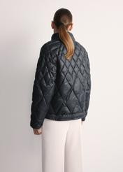 Black women's quilted jacket KURDT-0597-98(Z25), product view from the back on the model, half of the silhouette visible.
