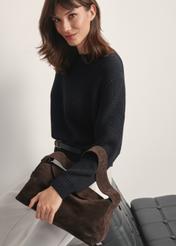 Dark brown suede handbag TORES-1186-89(Z25), front view of the product on a model, half of the silhouette visible.