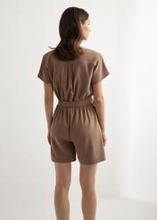Women's short viscose jumpsuit KOBDT-0014-1D(W26), back view of the product on the model. Half of the silhouette visible.