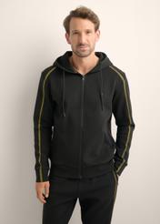 Men's black zip-up hoodie BLZMT-0083-99(Z26), front view of the product on the model. Half of the silhouette visible.