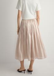 Women's shiny midi skirt SPCDT-0130-1B(W26), back view of the product on the model. Half of the silhouette visible.