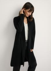 Black basic women's cardigan KARDT-0041-99(W25), front view of the product on the model. Half of the silhouette visible.