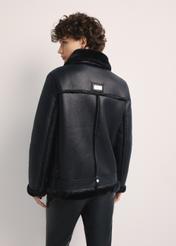 Black short women's sheepskin coat KOZDP-0001A-99(Z24), product view from the back on the model, half of the silhouette visible.