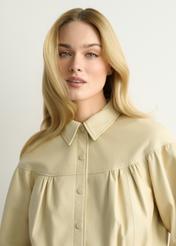 Light yellow women's leather jacket KURDS-0574-2A(W26), close-up of the product detail on the model.