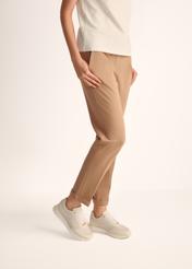 Cream leather women's sports shoes BUTYD-1099-11(Z25), product view on model's feet against a light background.