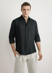 Men's black linen shirt KOSMT-0321A-99(W26) - front view of the product, on a model, against a light background. Half of the silhouette visible.