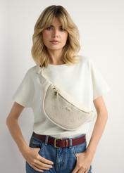 Women's cream monogram waist bag TOREC-1158-0B(W26), front view of the product on the model. Half of the silhouette visible.