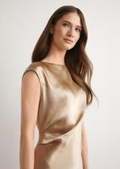 Long beige dress SUKDT-0266-1B(W26) - front view of the product, on a model, against a light background. Half of the silhouette visible.