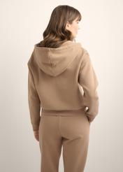 Women's camel zip-up hoodie BLZDT-0122-1D(Z26), product view from the back on the model. Half of the silhouette visible.