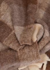 Brown women's scarf with wool SZADT-0234-1L(Z26), close-up of the product material on a white background.
