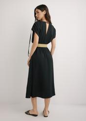 Black long dress with short sleeves SUKDT-0225-99(W26), back view of the product on the model. Full body visible.