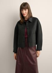 Women's short black wool coat PLADT-0067-99(Z26), front view of the product on the model. Half of the silhouette visible.