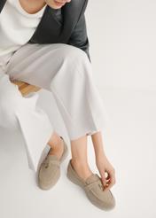 Beige leather women's moccasins BUTYD-1256-1B(W26), front view of the product on the model's feet.