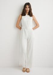 Cream women's jumpsuit KOBDT-0012-0B(W26), front view of the product on the model. Full body visible.