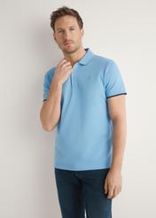 Blue cotton polo shirt POLMT-0045B-7B(W26), front view of the product on the model. Half of the silhouette visible.