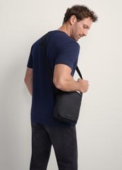 Black men's pouch TORMN-0366-99(Z25), product view on model. Half silhouette visible.