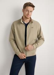 Beige men's lightweight transitional jacket KURMT-0370-1B(W26) - front product view, modeled, against a light background. Knee-length silhouette visible.