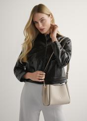 Beige women's shoulder bag TOREC-1182-1A(W26), product view on model's shoulder. Half of silhouette visible.