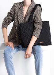 Black nylon women's bag TOREN-0224A-99(Z25), product view on model's shoulder. Half of silhouette visible.