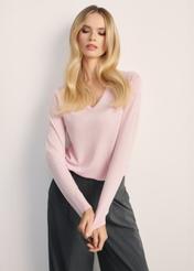Light pink women's sweater SWEDT-0250-34(Z25), front product view on model. Half of the silhouette visible.