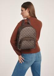 Women's backpack with monogram TOREC-0980A-89(Z25), front view of the product on a model, half of the silhouette visible.