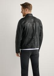 Men's black leather jacket KURMS-0397-99(W26) - back view of the product, on a model, against a light background. Knee-length silhouette visible.