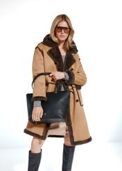 Black women's shopper bag TOREC-0953A-99(Z25), front view of the product on a model, half of the silhouette visible.