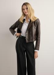 Brown women's leather jacket KURDS-0620-1I(Z26), front view of the product on the model, half of the silhouette visible.