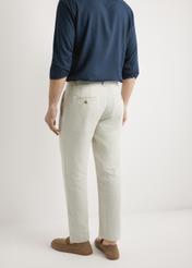 Beige men's linen trousers SPOMT-0119-1B(W26), product view from the back, on a model, against a light background. Half of the silhouette visible.