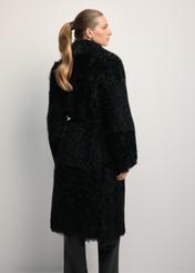 Black double-sided women's sheepskin coat KOZDS-0091-1395(Z25), back view of the product on the model. Half of the silhouette visible.