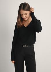 Black V-neck sweater SWEDT-0201-99(W24), front view of the product on the model, half of the silhouette visible.
