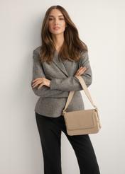 Beige women's messenger bag TOREC-1250-1B(Z26), front view on model. Half silhouette visible.